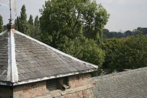 Photo: Loose and missing slates on the church tower